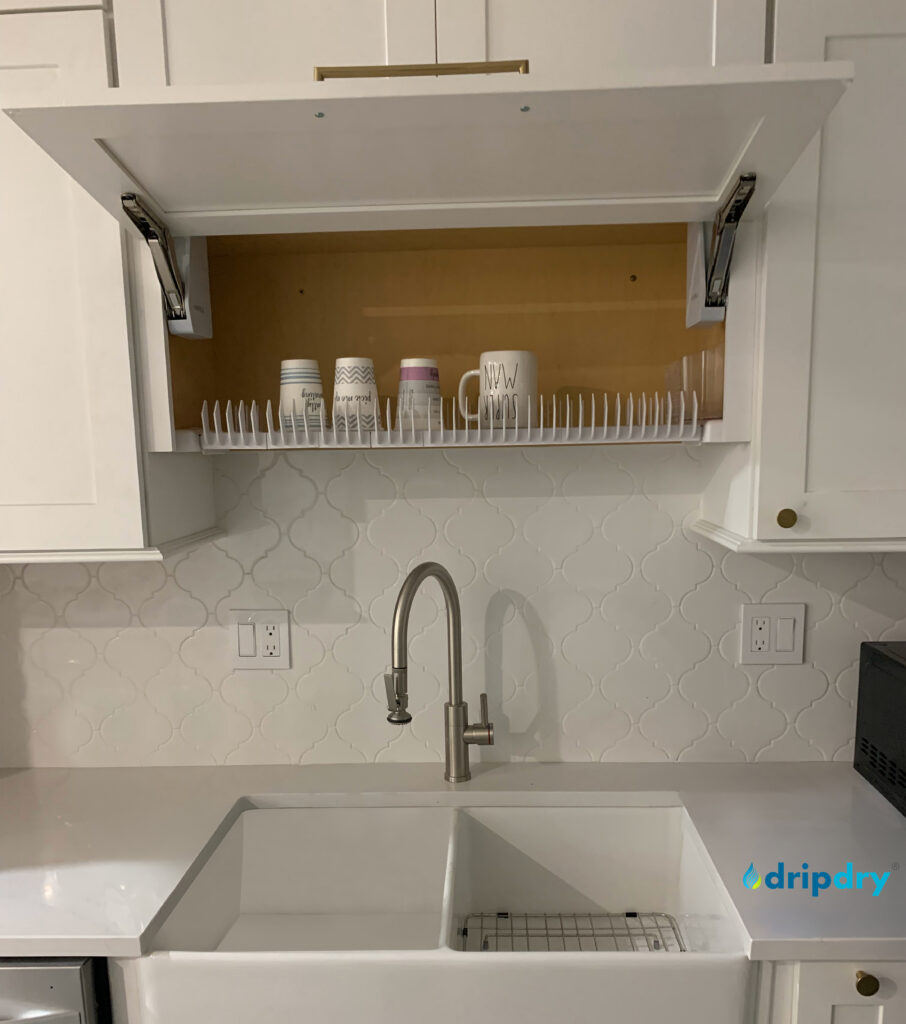 Single static dish drying rack above sink